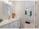 Bathroom featuring double sink vanity with white cabinets at 314 Savannah Pl, Loganville, GA 30052