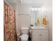 Small bathroom with shower curtain and white sink at 314 Savannah Pl, Loganville, GA 30052
