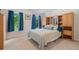 Spacious bedroom with carpet, large windows, and custom built-in cabinets at 314 Savannah Pl, Loganville, GA 30052