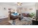 Open living room with hardwood floors and comfortable seating at 314 Savannah Pl, Loganville, GA 30052