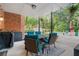 Outdoor patio with covered seating area and an outdoor grill perfect for entertaining guests and Gathering at 314 Savannah Pl, Loganville, GA 30052