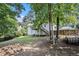 Expansive backyard with lush greenery, offering ample space for outdoor activities and relaxation at 47 Glen Ridge Dr, Villa Rica, GA 30180