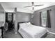 Bedroom with white ceilings and gray walls, carpeted floors and neutral-toned curtains at 47 Glen Ridge Dr, Villa Rica, GA 30180