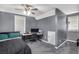 Bedroom with carpeted floors, large windows, and gray-painted walls at 47 Glen Ridge Dr, Villa Rica, GA 30180