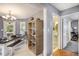 Bright dining area with an adjacent bathroom and hardwood floors at 47 Glen Ridge Dr, Villa Rica, GA 30180