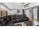 Bright living room with large sectional and hardwood floors at 47 Glen Ridge Dr, Villa Rica, GA 30180