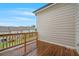 Outdoor back deck showcasing wood flooring and a view of the community and neighborhood at 5217 Riden Ct # 263, Buford, GA 30518