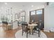 Open-concept kitchen with stainless steel appliances, center island, and a cozy breakfast nook with natural light at 5217 Riden Ct # 263, Buford, GA 30518