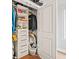 Organized walk-in closet featuring built-in shelving, drawers, and hanging rods for optimal storage at 5217 Riden Ct # 263, Buford, GA 30518