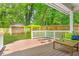 Beautiful backyard features a deck, privacy fence, and storage shed at 747 Dill Sw Ave, Atlanta, GA 30310
