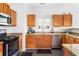 Updated kitchen with granite countertops and stainless steel appliances at 747 Dill Sw Ave, Atlanta, GA 30310