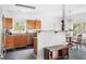 Well-equipped kitchen featuring wood cabinets, granite countertops, and stainless steel appliances at 747 Dill Sw Ave, Atlanta, GA 30310