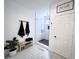 Stylish bathroom featuring a glass shower, hexagon tile, and modern fixtures at 128 Golden Hills Dr, Woodstock, GA 30189