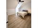 Serene bedroom with hardwood floors, creating a calming and comfortable atmosphere at 128 Golden Hills Dr, Woodstock, GA 30189