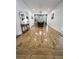 Dining area showcases stylish wainscoting and hardwood floors for an elegant design at 128 Golden Hills Dr, Woodstock, GA 30189