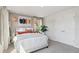Well lit bedroom with chic lamps, cozy carpet, and double door closet at 1305 Lakota Pl, Atlanta, GA 30315