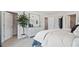 Spacious main bedroom showcasing an ample bed, a large window providing natural light, and soothing neutral tones at 1305 Lakota Pl, Atlanta, GA 30315
