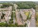 Aerial view of a residential community with tree-lined streets and manicured landscaping at 2110 Timball Nw Rd, Atlanta, GA 30318