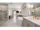 Luxurious bathroom with a glass-enclosed shower, dual vanity, and standalone tub, designed for relaxation at 2110 Timball Nw Rd, Atlanta, GA 30318