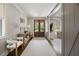 Bright foyer with decorative runner rug, gray walls, and white trim at 2110 Timball Nw Rd, Atlanta, GA 30318