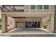Garage with ample parking space and storage, complemented by an outdoor stone paved driveway at 2110 Timball Nw Rd, Atlanta, GA 30318