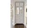 Hallway closet with mirrored doors and built-in storage, optimizing space in the home at 2110 Timball Nw Rd, Atlanta, GA 30318