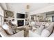 Spacious living room featuring a fireplace, neutral color scheme, and access to dining area at 2110 Timball Nw Rd, Atlanta, GA 30318