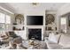 Bright living room features a fireplace, built-in shelving, and neutral decor at 2110 Timball Nw Rd, Atlanta, GA 30318