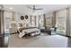 Spacious main bedroom with large windows, sitting area, and a neutral color palette creating a relaxing atmosphere at 2110 Timball Nw Rd, Atlanta, GA 30318