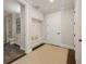 Mud room with a built-in bench, storage cabinets, and an adjacent bathroom at 2110 Timball Nw Rd, Atlanta, GA 30318