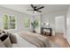 Bedroom with hardwood floors and filled with natural light at 3915 Ivy Ne Rd, Atlanta, GA 30342