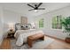 Cozy bedroom with hardwood floors, natural light and stylish decor at 3915 Ivy Ne Rd, Atlanta, GA 30342