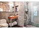 Modern bathroom featuring a glass shower enclosure and industrial-style sink at 1933 Mclendon Ne Ave # A, Atlanta, GA 30307