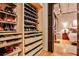 Organized walk-in closet featuring custom shelving, built-in drawers, and shoe racks at 1933 Mclendon Ne Ave # A, Atlanta, GA 30307