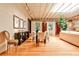 Elegant dining space boasting hardwood floors, modern lighting, and ample room for entertaining guests at 1933 Mclendon Ne Ave # A, Atlanta, GA 30307
