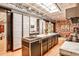 Modern kitchen with stainless steel appliances, marble countertops, and open layout at 1933 Mclendon Ne Ave # A, Atlanta, GA 30307