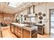 Modern kitchen featuring stainless steel appliances, marble countertops, and an open layout design at 1933 Mclendon Ne Ave # A, Atlanta, GA 30307