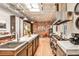 Spacious kitchen featuring stainless steel appliances, marble countertops, and hardwood floors at 1933 Mclendon Ne Ave # A, Atlanta, GA 30307