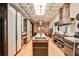 Contemporary kitchen with stainless steel appliances, marble countertops, and an open concept design at 1933 Mclendon Ne Ave # A, Atlanta, GA 30307