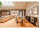 Spacious living room features an open floorplan, high ceilings, hardwood floors, and ample natural light at 1933 Mclendon Ne Ave # A, Atlanta, GA 30307