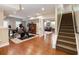Finished basement boasts wood floors, workout area, and additional living space at 1975 River Forest Drive, Marietta, GA 30068