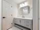 Bathroom featuring vanity with drawers, and a large frameless mirror at 1975 River Forest Drive, Marietta, GA 30068