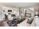 Cozy living room featuring hardwood floors, comfortable seating, and a stylish area rug at 1975 River Forest Drive, Marietta, GA 30068
