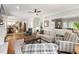 Open-concept living area featuring hardwood floors, a fireplace, and a seamless flow to the kitchen at 1975 River Forest Drive, Marietta, GA 30068