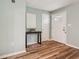 Entryway featuring wood-look floors, white trim, and a hall table at 1977 Wee Kirk Se Rd, Atlanta, GA 30316