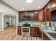 Updated kitchen with granite counters, stainless appliances, and wood-look floors at 1977 Wee Kirk Se Rd, Atlanta, GA 30316