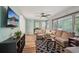 Comfortable living room with a ceiling fan, large sectional sofa, and TV at 1977 Wee Kirk Se Rd, Atlanta, GA 30316