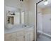 Bathroom features a single vanity, and a shower/tub combination at 4135 Sunrise Trail, Atlanta, GA 30349