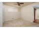 Bedroom with ceiling fan and natural light at 4135 Sunrise Trail, Atlanta, GA 30349