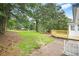 Expansive backyard featuring a newly built wooden deck, providing the perfect outdoor relaxation and entertainment at 4188 Fontana Ct, Tucker, GA 30084